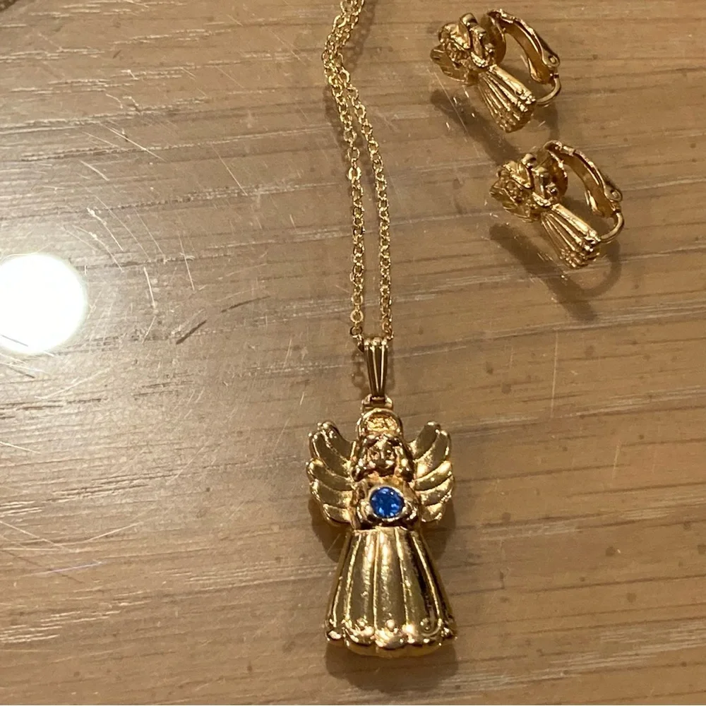 Vintage 90’s Avon Golden Heavenly Angel Pendant/Clip on Earrings. Blue Stone